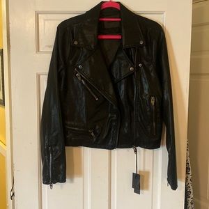 Beautiful faux leather motorcycle jacket. Great details and fit. Size L